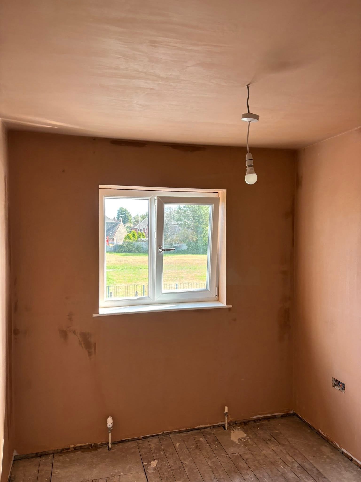 Exterior wall after rendering by SLW Plastering