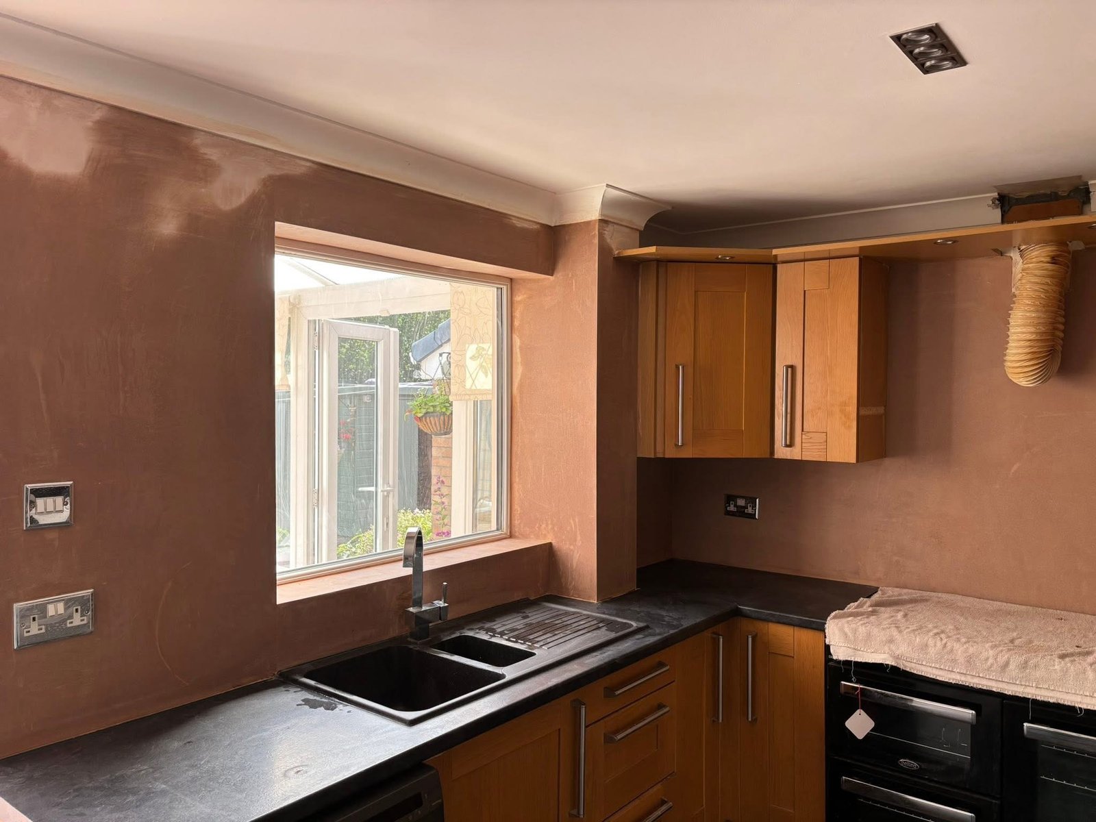 Completed plastering job on a Kitchen by SLW Plastering