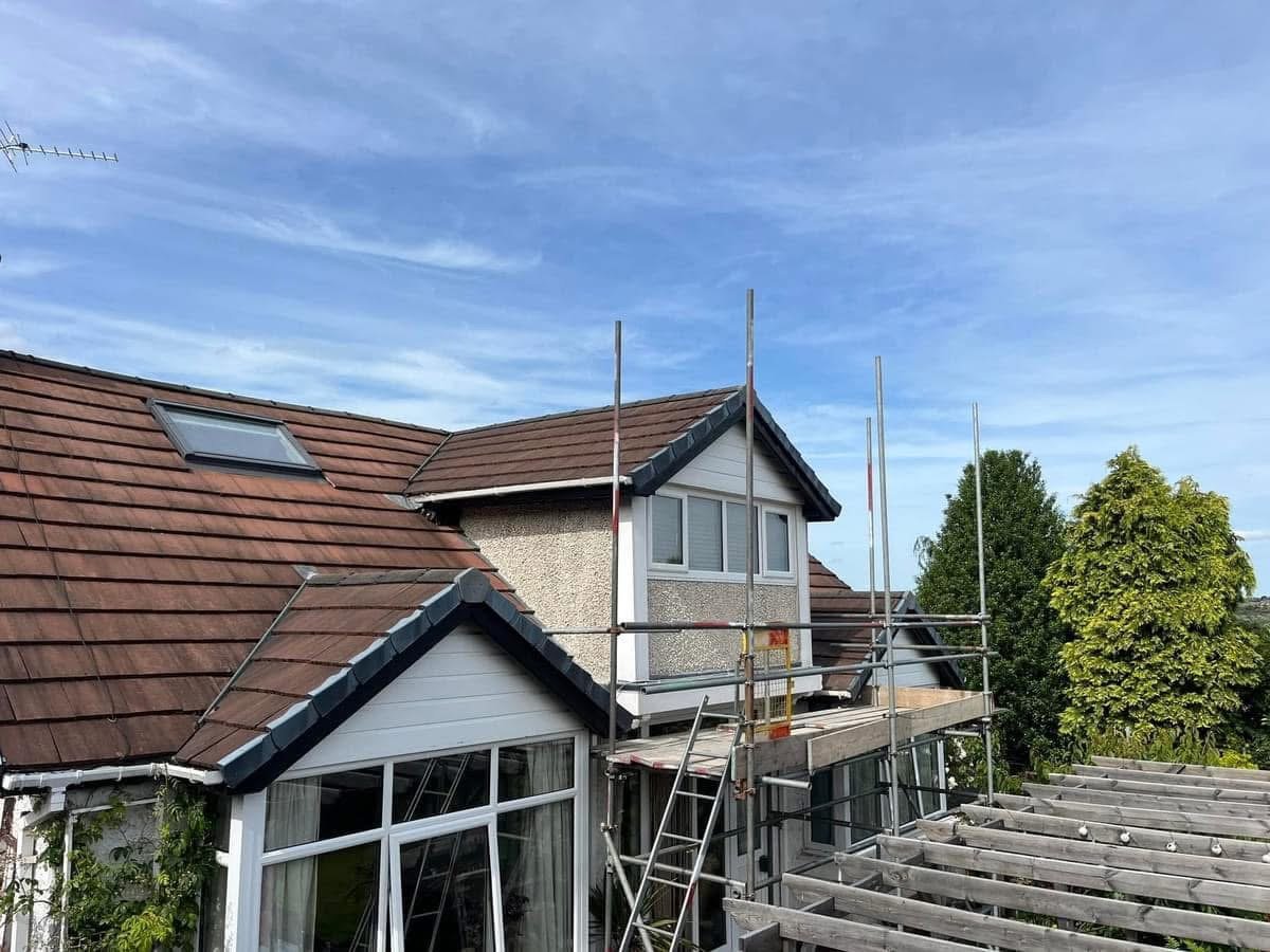 An in progress image of exterior rendering work being completed by SLW Plastering